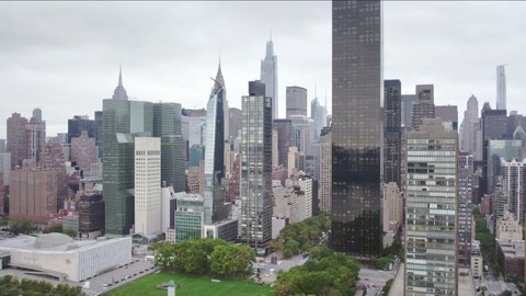 NEW YORK CITY, USA - Nov 21, 2021: Aerial drone view of Manhattan skyscraper buildings in New York City cityscape. NYC is financial, economic and business center of America.  