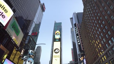 NEW YORK CITY, USA - OCT 21, 2021: Drone low angle aerial view Times Square street with billboard ads screens in Manhattan New York City. NYC is a modern urban business city in USA, iconic landmark   