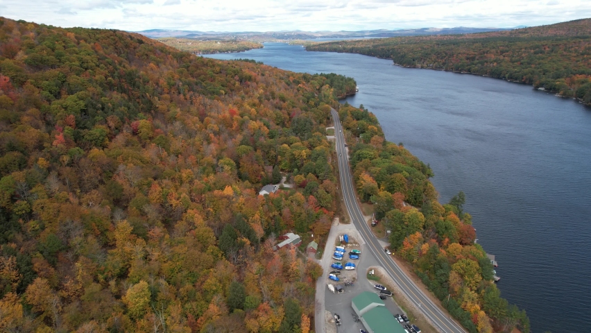Lake Sunapee, New Hampshire USA. Aerial View of Road in Idyllic Colorful Autumn Landscape, Drone Shot