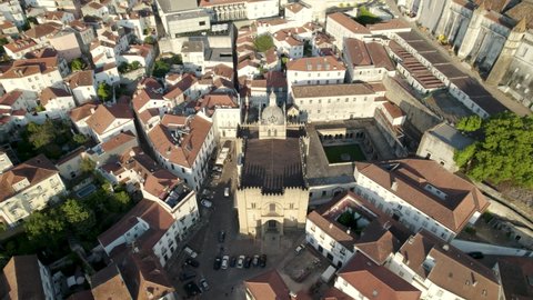 Aerial top down view Old Coimbra Romanesque Cathedral, historic Downtown - Portugal