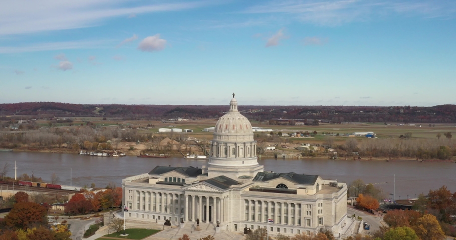 Missouri State Capitol building in Jefferson City, Missouri. Drone video moving down.