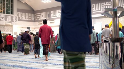 Rawang, Selangor, Malaysia - May 5, 2019 - Tarawih prayer in a mosque with a crowded congregation.