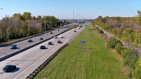 4K aerial clip of Canadian Highway 40 in the Montreal suburbs. 