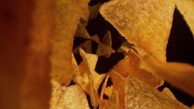 Super Slow Motion Shot of Flying Tortilla Chips Towards the Camera on Black Background at 1000fps. - Powered by Shutterstock - Get 15% off with code: PIKWIZARD15