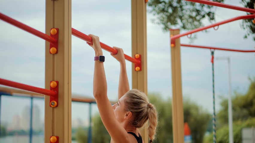 Fitness Girl Sports Recreation Outdoors Lifting Weights. Fit Girl In Sportswear Sport Exercising. Outdoor Training Workout Muscle Strength. Sportive Woman Fitness Workout On Street Sport Recreation Royalty-Free Stock Footage #1083188446