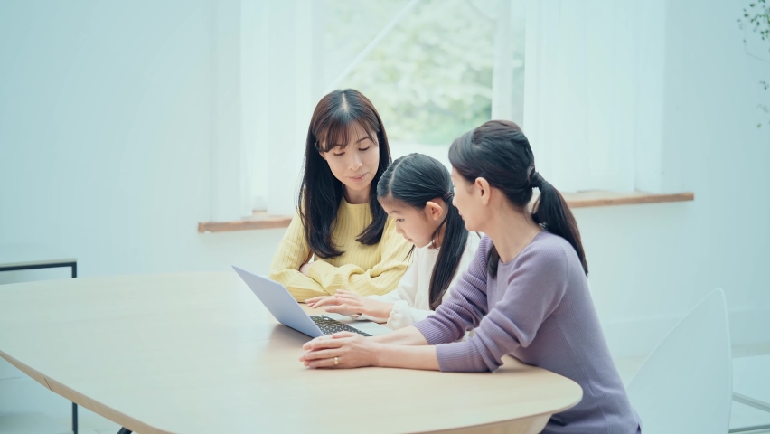 Asian family watching hologram screens. Digital contents. Video distribution service. Royalty-Free Stock Footage #1083192304