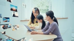 Asian family watching hologram screens. Digital contents. Video distribution service. - Powered by Shutterstock - Get 15% off with code: PIKWIZARD15