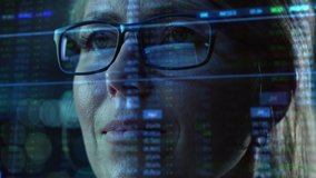 Portrait of Female Digital Entrepreneur Working on Computer, Line of Code Projected on His Face and Reflecting in Glasses. Developer Working on Innovative e-Commerce App using AI and Big Data - Powered by Shutterstock - Get 15% off with code: PIKWIZARD15