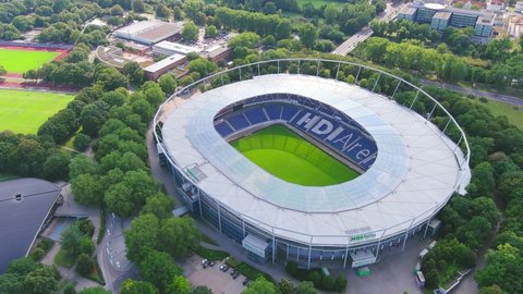 HANOVER, GERMANY, EUROPE - CIRCA 2020: Aerial view of city in Germany, Niedersachsenstadion stadium (HDI Arena), famous soccer stadium and home of German Bundesliga football club Hannover 96.
