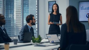 Diverse Office Conference Room Meeting: Successful Male Executive Director Presents e-Commerce Fintech Growth Statistics to a Group of Investors. Wall TV with Big Data Analysis, Infographics, - Powered by Shutterstock - Get 15% off with code: PIKWIZARD15