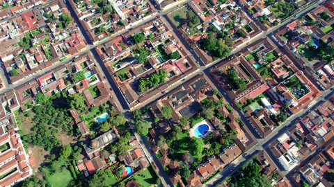 Antigua, Guatemala. Central American Colonial Town Street Blocks Grid. 4K Drone.
