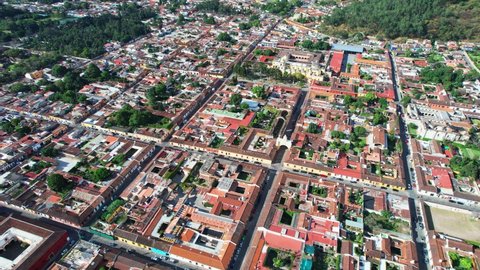 Antigua, Guatemala. Colonial City Street Blocks Showing Landmarks. 4K Drone.
