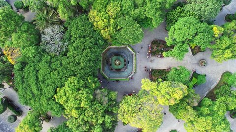Central Park Plaza Mayor Antigua, Guatemala. Green Trees In Colonial City Center Park. 4K Drone.