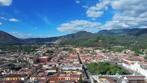 Antigua, Guatemala. 4K Drone. Panoramic View Of Colonial Unesco City Blocks.