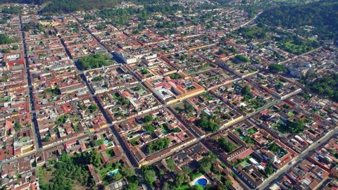 Antigua, Guatemala. Panoramic view of colonial UNESCO town. 4K Drone.