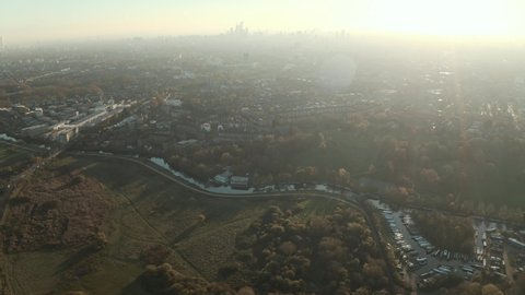 Slider drone shot of Lea river valley and central London skyline
