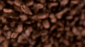 Coffee beans explosion. Super slow motion at 1000 fps, filmed on high speed cinematic camera.