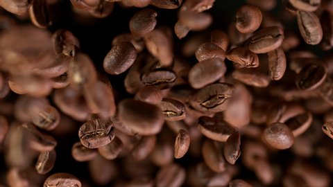 Coffee beans explosion. Super slow motion at 1000 fps, filmed on high speed cinematic camera.