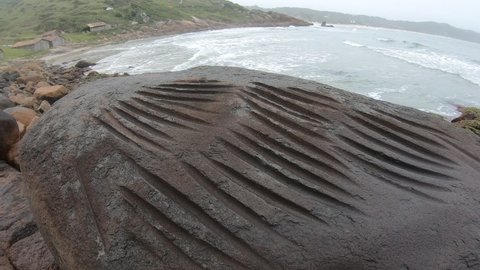 Neolithic workshop at Praia do Rosa, rock marks left by prehistoric peoples, who used rocks to produce utensils - Imbitub, Santa Catarina, Brazil