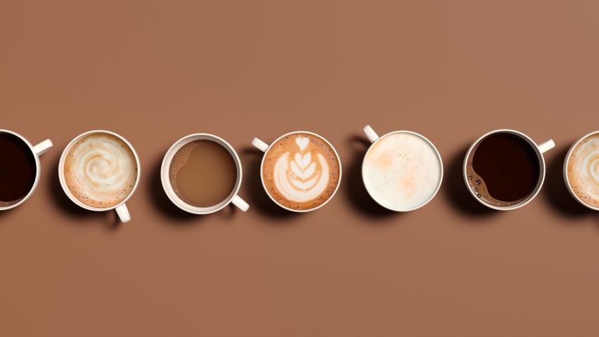 Different coffee drink types. Top view on the brown table with delicious hot beverages in cups. Art latte, cappuccino, americano, espresso, flat white, mocha, cortado. Cafeteria, barista. Caffeine. | Shutterstock HD Video #1083235543