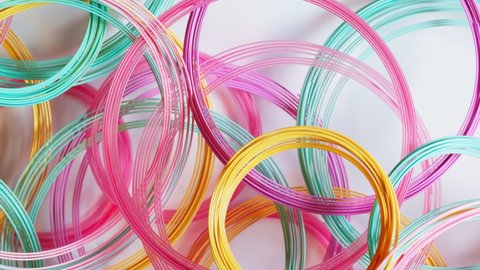 Multicoloured filaments of plastic. Printing on a 3D printer. 3D printing motley different colours thermoplastic filament. Additive technology. Motley wire plastic for 3d printer. Seamless loop.