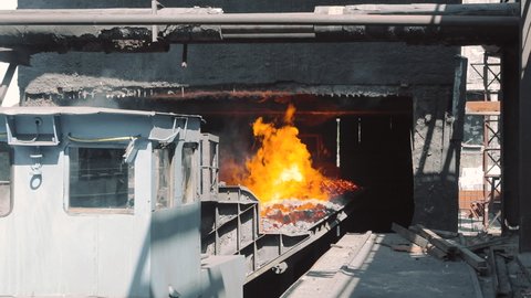 Hot coke coal leaves the furnace. Coal coking process, coke oven coal making process