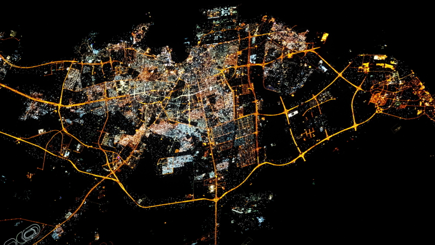 Night light city of Doha, Qatar, view from space with flashing lights. Images furnished by Nasa