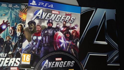 Rome, Italy - November 18, 2021, detail of the cover of the film, in DVD Avengers, film of 2012 written and directed by Joss Whedon and cover with Blu ray of the videogame action-adventure for Ps4.