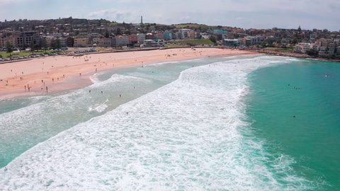 Aerial view of Bondi Beach Sydney Australia. People relax on sea coast