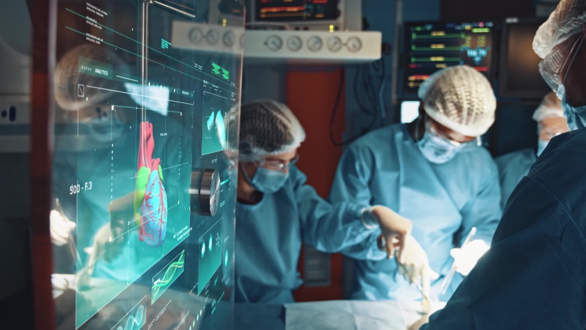 Heart surgery. Inside professional healthcare clinic with medical workers performing surgical operation. Augmented reality holographic anatomy scan of patient's heart. Modern medicine. Virtual reality