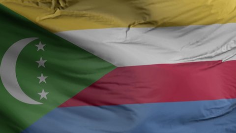 Comoros flag seamless closeup waving animation. Comoros Background. 3D render, 4k resolution