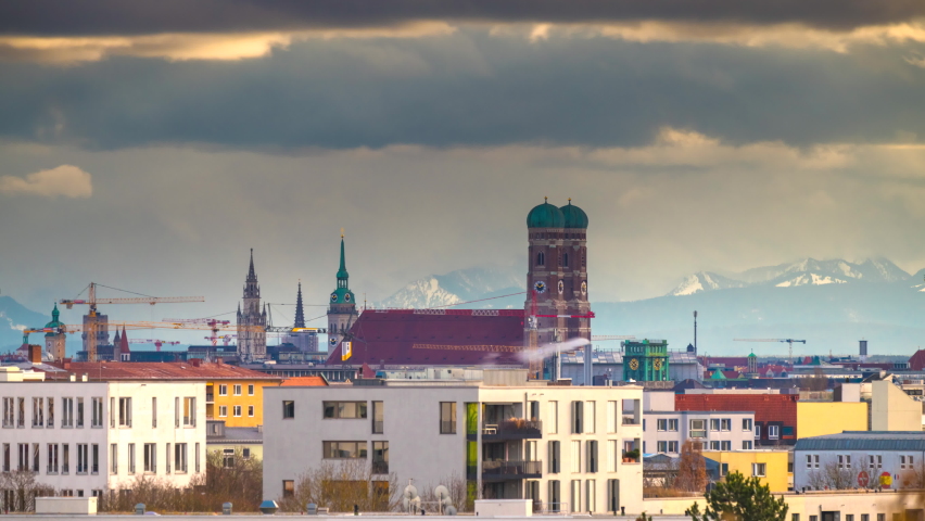 Munich skyline downtown view, munich frauenkirche church cathedral marienplatz square in background alps mountains winter snow time lapse video. Royalty-Free Stock Footage #1083282997