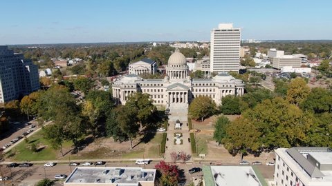 Jackson, MS - October 2021: Camera flies towards The Mississippi State Capitol Building in downtown Jackson, MS
