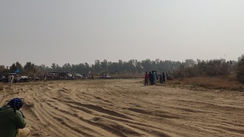 Multan, Pakistan November, 2021:  people of rural areas are enjoying and participating  in a famous rural sport "off road 4 by 4 desert jeep rally "  in  south Punjab, Pakistan