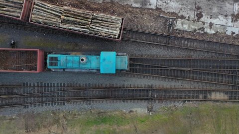railway wagons loaded with logs top view.