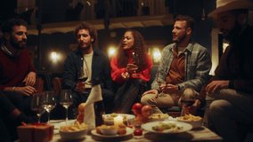 Big Dinner Garden Party Celebration with Friends on a Warm Summer Evening. Beautiful People Enjoy Life on a Terrace, Chat, Relax on Weekend, Have Fun, Drink Wine, Give Toasts and Eat Homemade Food. - Powered by Shutterstock - Get 15% off with code: PIKWIZARD15