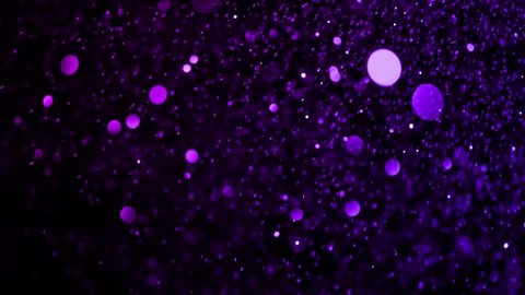Number 2022 neon light bright glowing. 2022 happy New Year dark background with decoration with neon number on black Beautiful purple and blue Glitter Floating background. winter holiday template.