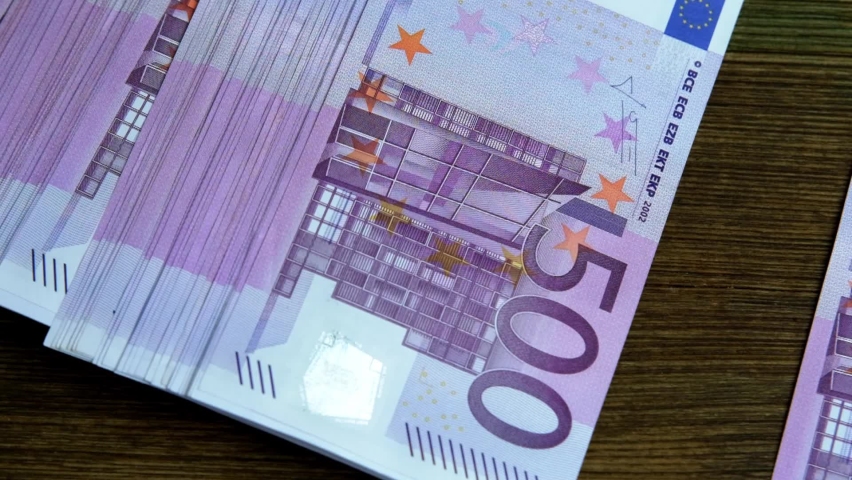 closeup paper 500 euro banknotes of eu slowly fall on old wooden table, slide along it, concept of cash, payments, savings, banking, return money debt, car, win in casino, get passive income Royalty-Free Stock Footage #1083317200