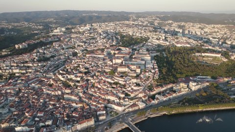 Panoramic view of Coimbra sprawling cityscape with University on top of the hill.