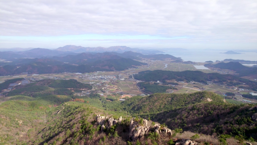 Drone Footage _ This Mountain located at the southwest end of South Korea. The mood of late autumn, aerial landscape. Royalty-Free Stock Footage #1083342004
