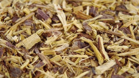 Ayurvedic herb crushed dried Liquorice root. Macro. Rotation. Glycyrrhiza glabra medicinal healing ingredient