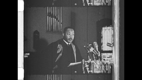 April 30, 1967, Atlanta, GA. Speaking from the pulpit at Ebenezer Baptist Church, Dr. Martin Luther King, Jr. criticizes the Vietnam War. 4K Overscan of Vintage Archival 16mm Newsreel Film Print