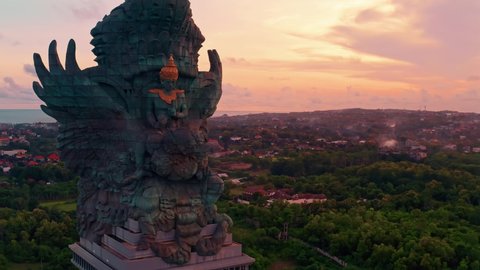 Bali's Most Iconic Landmark Hindu God Garuda Wisnu Kencana statue also GWK statue is a 122-meter tall statue located in Garuda Wisnu Kencana Cultural Park, Bali, Indonesia.