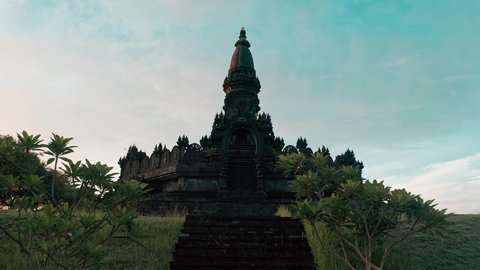 Bajra Sandhi or Monumen Taman Mumbul monument to the struggle for independence in the rays of the rising sun. Bali, Indonesia. 4K Aerial view
