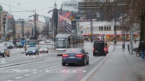 Helsinki, Finland - November 10, 2021: The brand new ForCity Smart Artic Jokeri X54 tram. View of the Mannerheimintie street. The first tram for the Jokeri Light Rail line