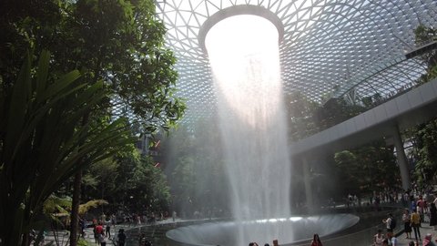 Singapore, Singapore-May 31, 2019: Rain Vortex waterfall, Jewel Changi Airport, the World's Tallest Indoor Waterfall. The Changi is the World's Best Airport by Skytrax for the seventh consecutive year
