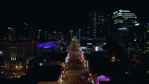 Nashville , TN , United States - 11 24 2021: Aerial moving over empty broadway late at night in downtown Nashville