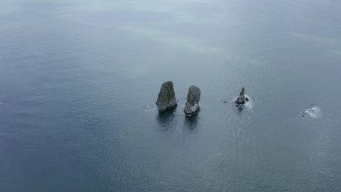 Three Brothers is a famous landmark in the Avacha Bay. Kamchatka Peninsula, Russia