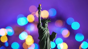 Miniature Statue Of Liberty with Christmas Color Lights - Powered by Shutterstock - Get 15% off with code: PIKWIZARD15
