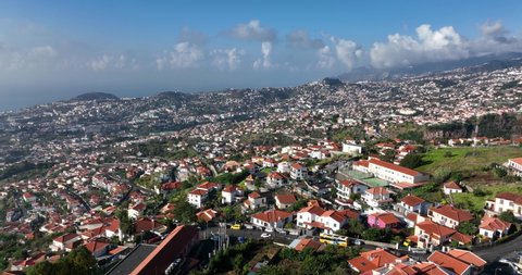 Capital of Funchal on Madeira island, Portugal beautifull panorma view over the hills and mountains on a sunny day.